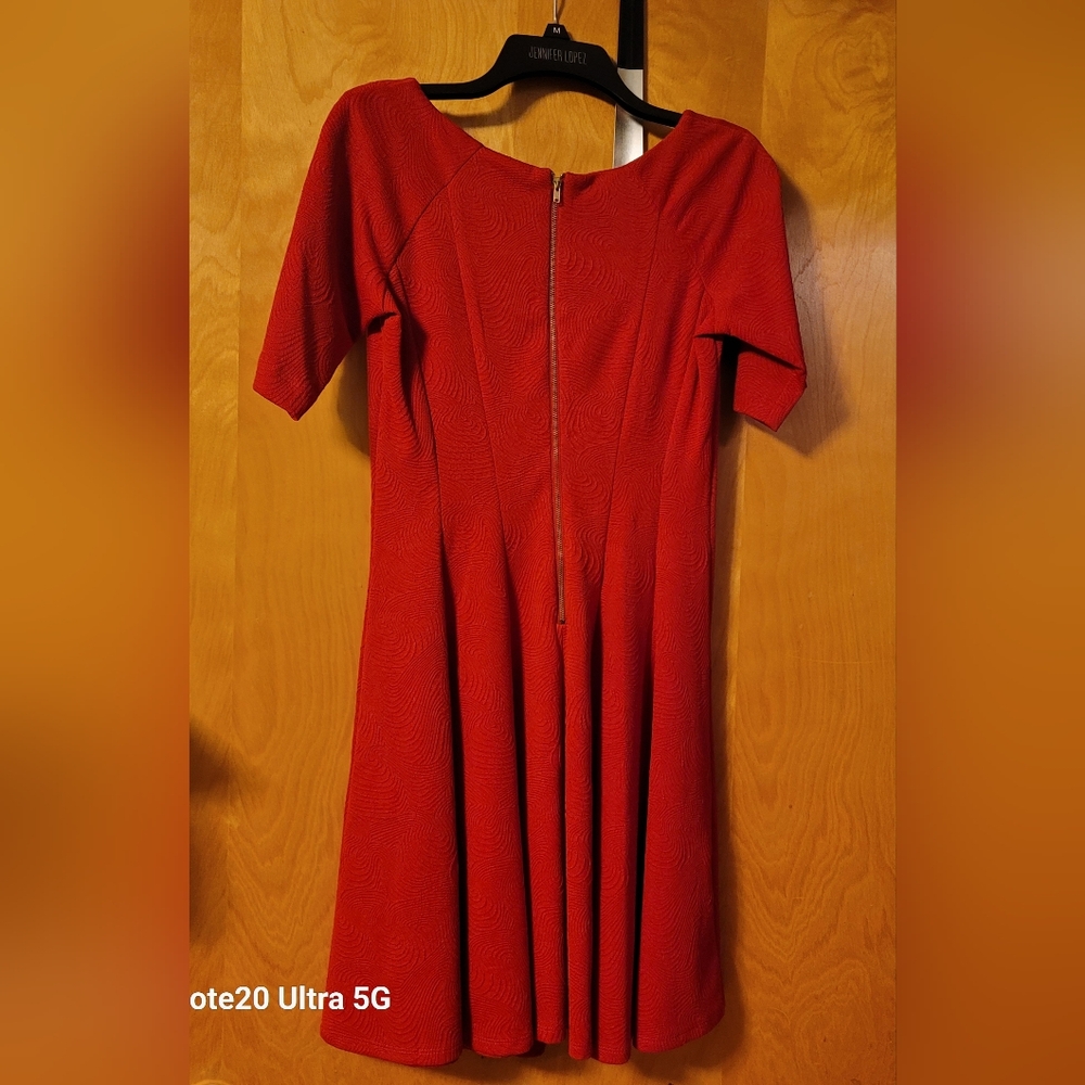 Womens red dress size 8. Never worn.